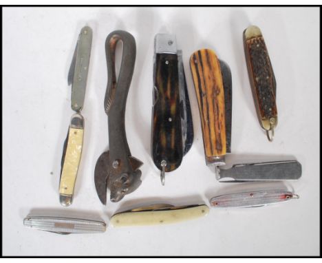 A early 20th century Bull Head Can Opener, together with collection of vintage 20th Century pen knives of various forms to in