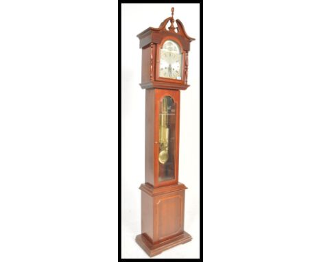 A contemporary 20th Century reproduction mahogany longcase clock, stepped arch hood, gilt dial with silvered Roman chapter ri