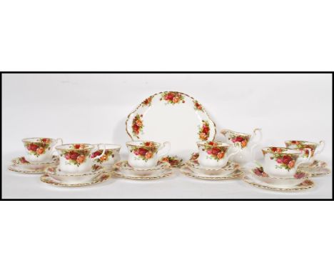 A 20th Century Old Country Roses First tea service consisting of six cups saucers and side plates, sugar bowl, creamer / milk