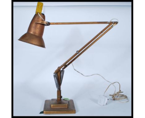 A vintage pre war Herbert Terry Anglepoise table / desk lamp in original gold painted finish. Features a solid cast two tiere