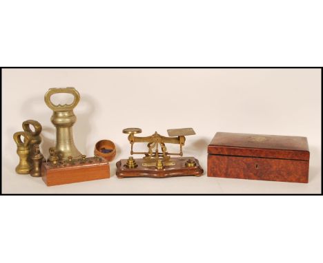 A set of vintage 20th Century postage balance scales along with brass gram weights within a fitted wooden case, along with a 