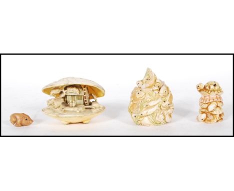 A collection of 20th Century Asian ornaments to include a Harmony Kingdom netsuke style box with a twist lid along with an SI