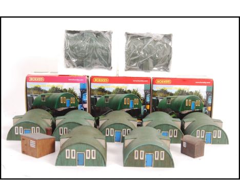 A collection of 12x Hornby Skaledale 00 Gauge model railway locomotive train set R8788 Corrugated Nissen Hut. All appear mint