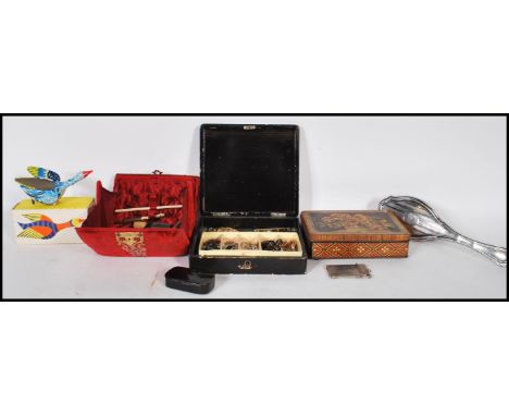 A collection of 19th Century and later items to include a red velvet sewing case having turned bone sewing tools, a lacquered