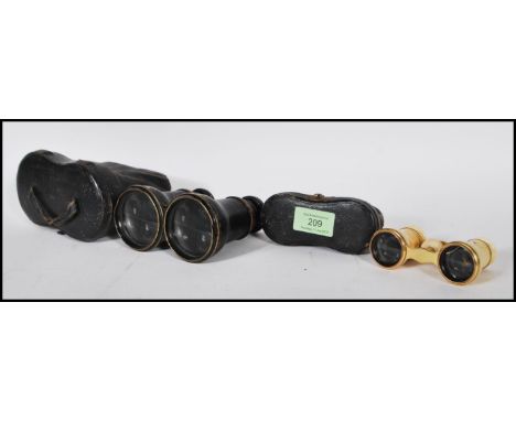 A pair of 19th Century French opera ivory glasses being brass mounted and inscribed 'Duchesse 12 Verres', set within a vintag