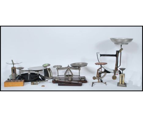 A collection of vintage 20th Century miniature scales to include postage scales, a set of egg balance scales, sovereign scale