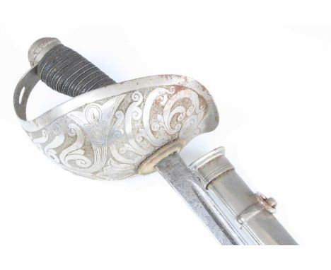 A British 1912 pattern Officer's Cavalry sword for the 18th Royal Hussars, the 89cm fullered blade etched with a crowned GR V