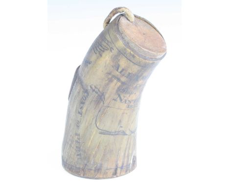 A 19th century American horn powder flask, scrimshaw decorated with an American Eagle with anchor and cannon below, the oppos