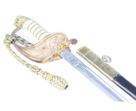 An E.R. II. Naval presentation sword, the 79cm blade etched "Presented By The Shaftsbury Homes And Arethusa To Sub-Lieutennat