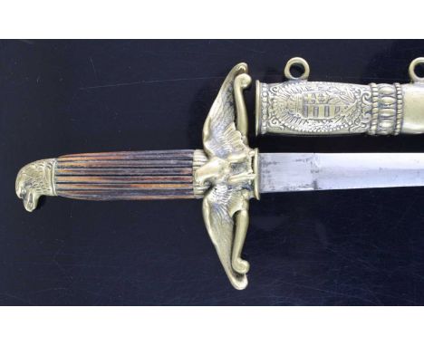 A Hungarian 1932? pattern dress dagger, having a 20cm flattened diamond section blade, the brass crossguard with eagle emblem