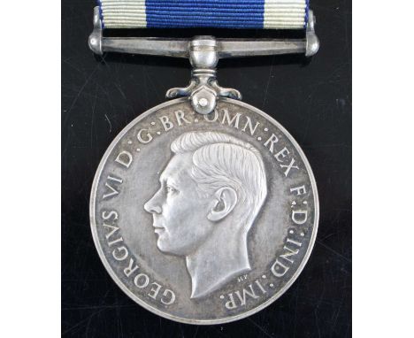 A Naval Long Service and Good Conduct Medal, Geo. VI, naming K. 60156 T. WORGER. L. STO. H.M.S. DOLPHIN, together with five W