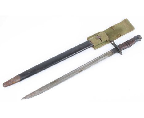 A Remington M1917 bayonet, the 43cm single edged fullered blade marked to the ricasso 1917 Remington with an eagle and flamin