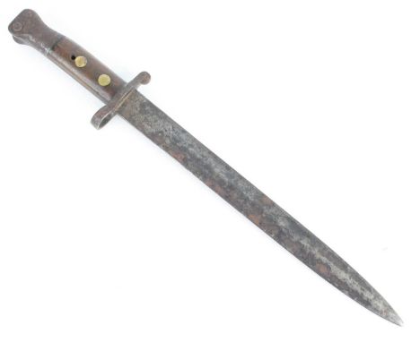 A British 1888 pattern bayonet, the 30cm blade with various Ordnance marks to the ricasso, having a two piece grip with oil h