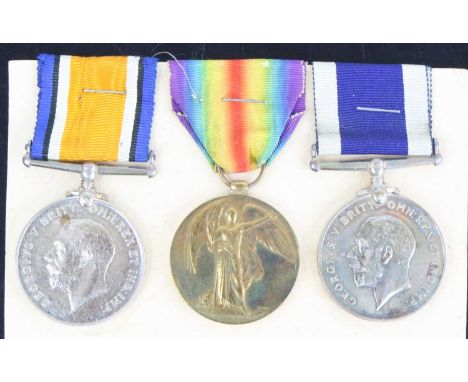 A Naval group of three medals to include British War and Victory, naming K. 57044. A.E. BUCK STO. 1. R.N. and Long Service an