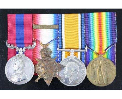 A Great War Gallantry group of four medals to include Distinguished Conduct Medal, naming 10138 PTE. E.C. HERRIDGE. I/K. R. R