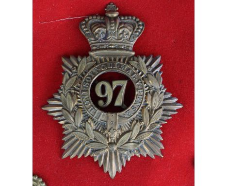 A 97th Earl of Ulster's Regiment of Foot Other Ranks helmet plate, the central 97 within garter and wreath, on a crowned seve