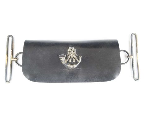 A British Light Infantry dress pouch, in black leather with applied silvered bugle badge and silver belt fittings by Joseph J