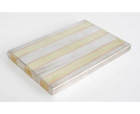 A George V Cartier silver, silver-gilt and yellow metal cigarette case, of rectangular form with push thumbpiece to release t