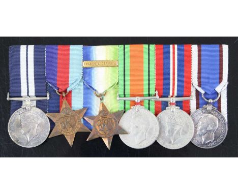 A Naval group of six medals to include Distinguished Service Medal (Geo. VI.), naming K. 6164 F.A. TYLER. STO. H.M.S. SCIMITA