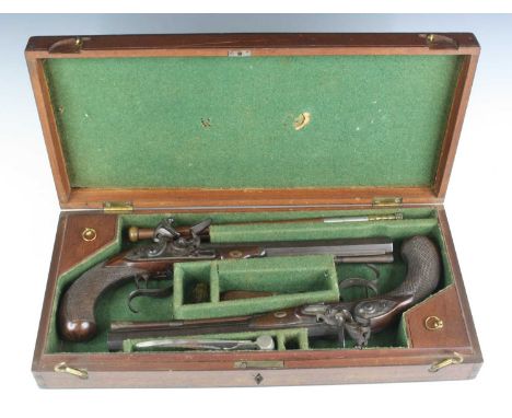 Wogdon and Barton, a cased pair of early 19th century flintlock duelling pistols, each having a 25cm octagonal barrels engrav
