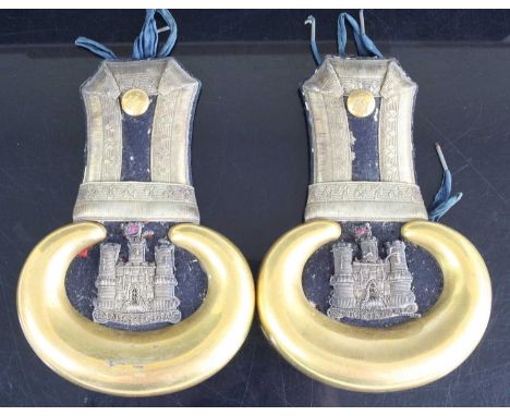 A pair of Victorian shoulder epaulettes for the 27th (Inniskilling) Regiment of Foot, each embroidered with the Inniskilling 