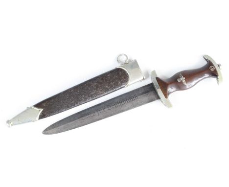 A German Third Reich SA (Sturmabteilung) dress dagger, the 22cm flattened diamond section blade etched Alles fur Deutschland 