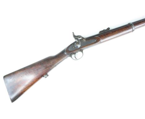 A 19th century percussion two band rifle, the 82cm barrel with folding ladder sight, stamped Manton &amp; Co. Gunmakers Calcu