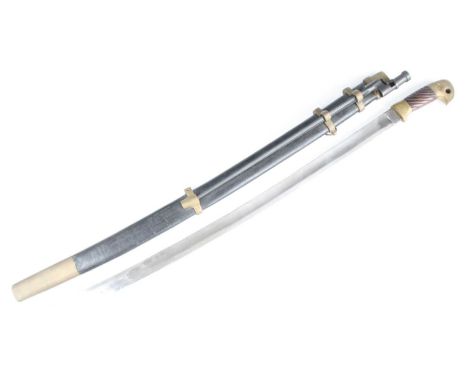 A Russian Cossack's Shaska sword, the 81cm curved single-edged blade marked to the ricasso 1925r, having a carved wooden grip