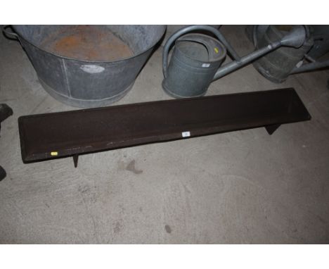 A long cast iron trough, 59" long&nbsp;approx.