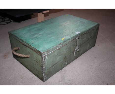 A ship's toolbox with rope handles and painted