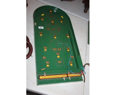 A Chad Valley Bagatelle board 