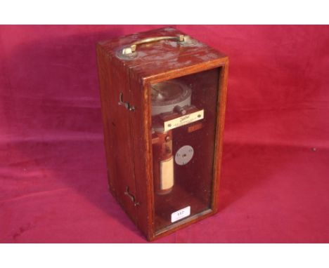 A Sestrel hand held compass, by Henry Brown &amp; Son Ltd. of Barking London, in fitted wooden glazed case