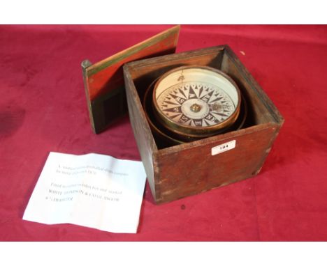 A Nautical Marine gimbaled ship's compass for metal ships circa 1876, in orginal box and marked 'White Thompson &amp; Co. Gla