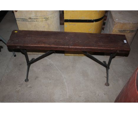 A Victorian metal framed and wooden bench 