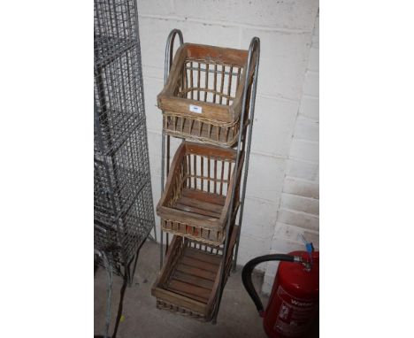 A three shelf graduated vegetable rack