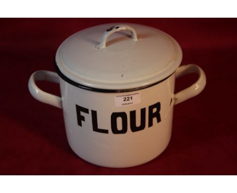 An enamel flour kitchen container 