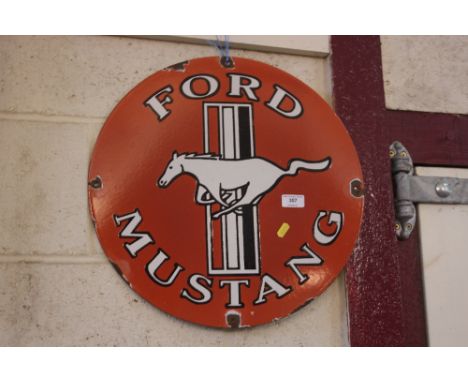 A circular "Ford Mustang" enamel sign, 18" dia. approx.