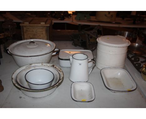 A quantity of enamel ware including jugs, bowls etc. 