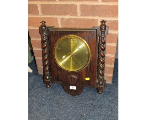 A LARGE OAK BRASS FACED BAROMETER H-47 CM