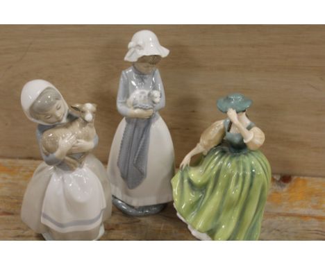 A ROYAL DOULTON FIGURINE BUTTERCUP, TOGETHER WITH TWO NAO FIGURES (3)