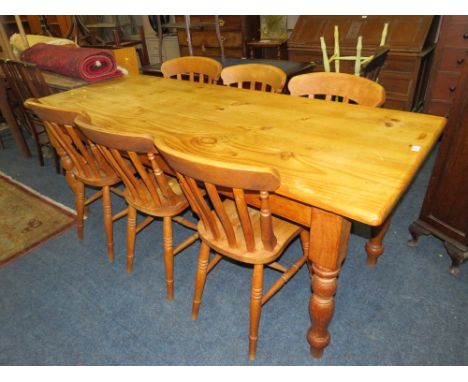 A LARGE HONEY PINE FARMHOUSE TABLE WITH SIX CHAIRS H-77 CM W-77 CM L-200 CM