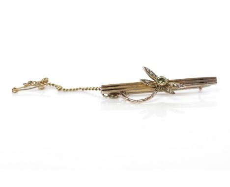 EDWARDIAN PERIDOT AND PEARL SET DRAGONFLY MOTIF BROOCH
the dragonfly formed by a peridot body, the wings set with seed pearls