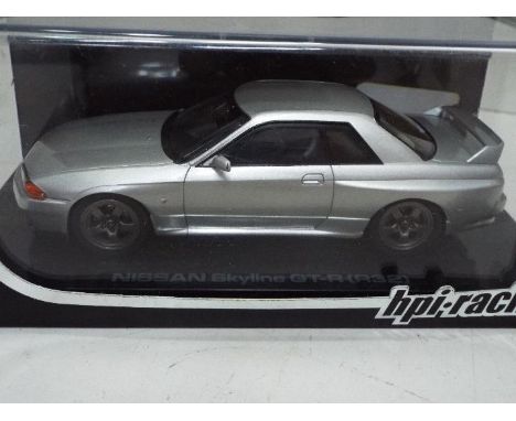 HPI Racing - Slot Car in 1:32 Scale - # 8522. Nissan Skyline GT-R (R32) Jet silver metallic. Appears mint in presentation cas