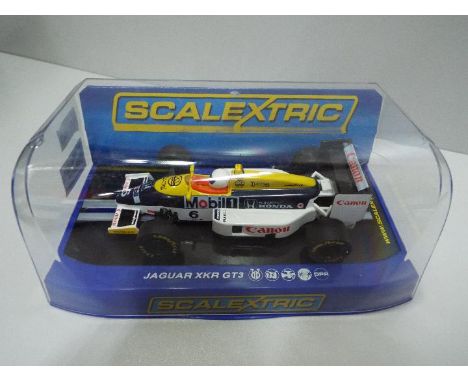 Scalextric - Slot Car model in 1:32 Scale - Formula Honda. Incorrect box. Appears mint in presentation case. Light storage we