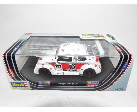 Revell - Slot Car in 1:32 scale. # 08386 Uniroyal Fun Car Cup. Vehicle appears mint in perspex presentation case. Light stora