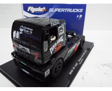 FlySlot - Slot Car model in 1:32 Scale - Supertrucks. # 203104 MAN TR 1400 FIA ETRC 2012. Driver was Mika Makinen. Appears mi