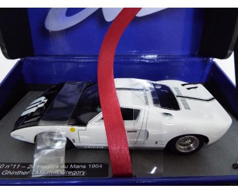 Le Mans - Slot Car in 1:32 Scale - Ford GT 40 No. 11 - 24. Drivers - Ghinther and Gregory. Appears mint in presentation case,