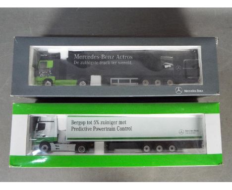 NZG - 2 x boxed 1:50 scale Mercedes Benz Actros 1851 Fuel Duel models in White and Green and black and green, this one has a 