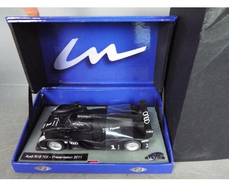 Le Mans - Slot Car in 1:32 Scale - Audi R18 Tdi - Presentation 2011. Appears mint in presentation case, with storage wear to 
