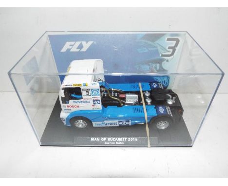 Fly Slotwings - Slot Car in 1:32 scale. # Truck 61 Man GP Bucharest 2016. Vehicle appears mint in perspex presentation case. 